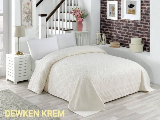 Махровая хлопковая жаккардовая простынь Dewken crem кремового цвета 150х220