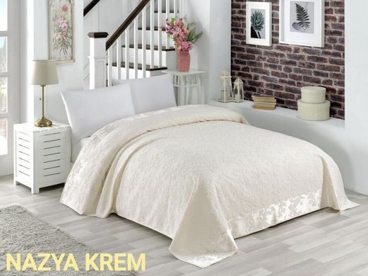 Махровая хлопковая двухсторонняя простынь Nazya crem кремового цвета 150х220