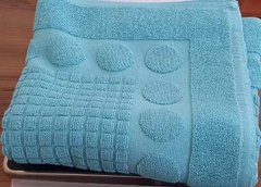 Зеленый махровый коврик в ванную 750 г/м2 50х70 Ножки